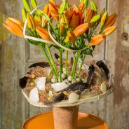 Orange Easter arrangement with Sunderland lilies - closed