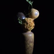 Serene funeral arrangement in a vase