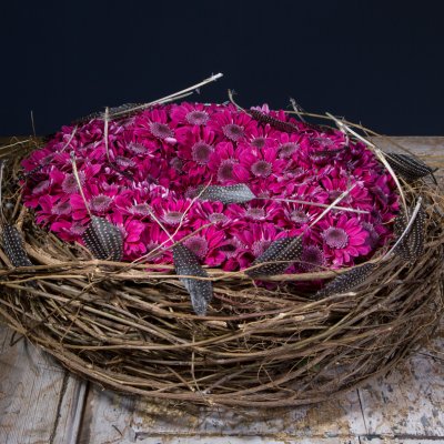Purple funeral flower design
