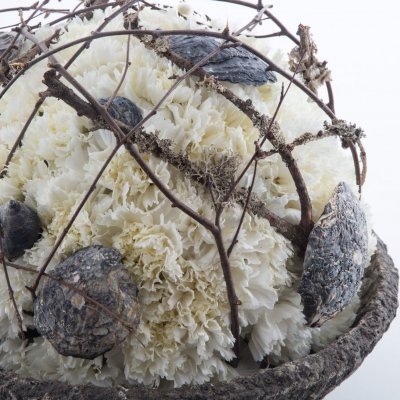 Spherical funeral arrangement with Dianthus