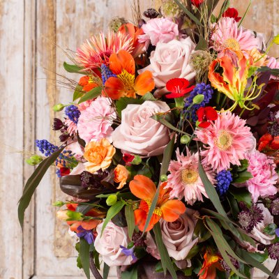 Rich flower arrangement in floral foam