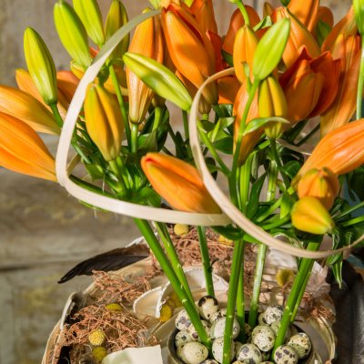 Orange Easter arrangement with Sunderland lilies