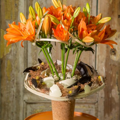 Orange Easter arrangement with Sunderland lilies