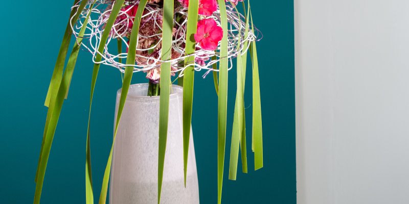 Frame bouquet with pink carnations