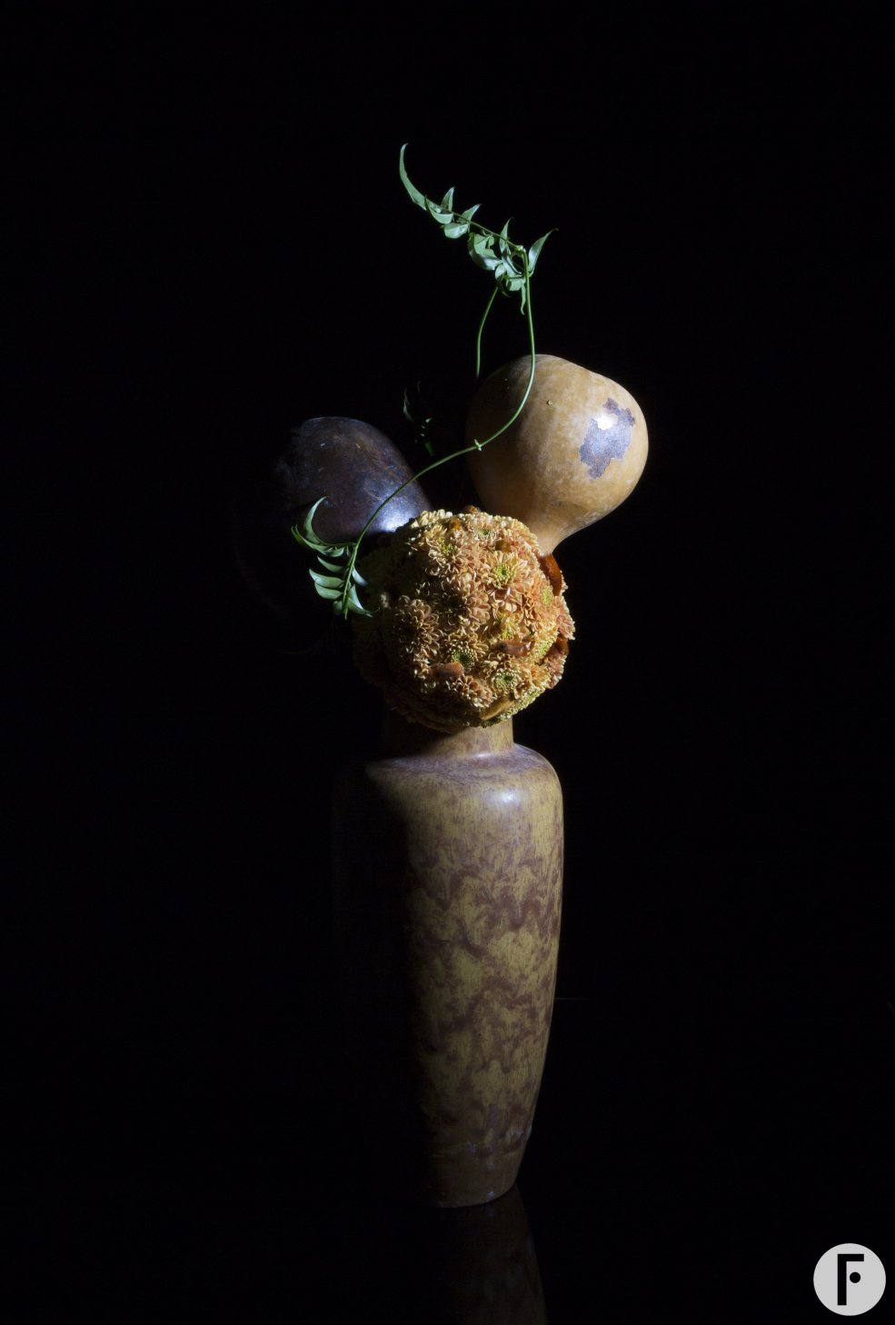 Serene funeral arrangement in a vase