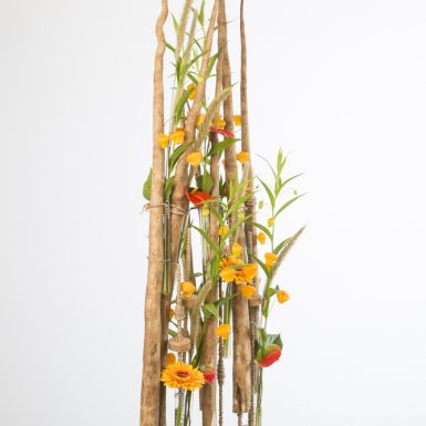 Flower arrangement with wooden frame by David Ragg