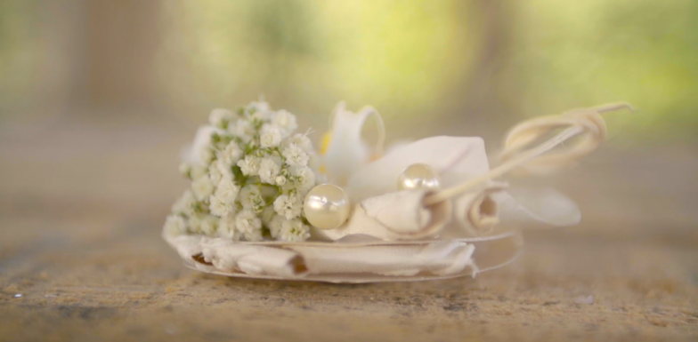 Classic white boutonniere with a twist