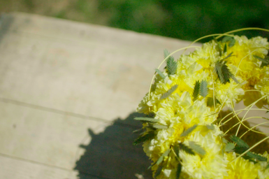 A summer flower arrangement with yellow Chrysanthemums