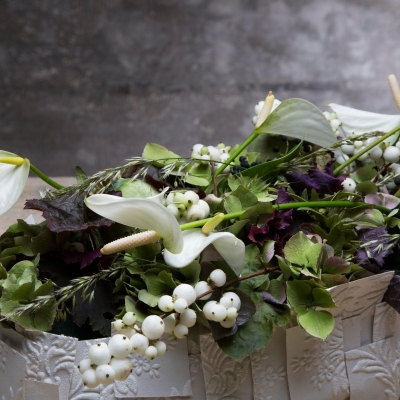 White funeral flower design with anthurium - close