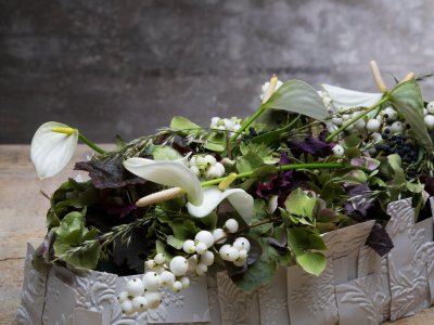 White funeral flower design with anthurium - close