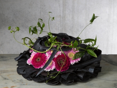 Black funeral flower arrangement