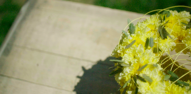 A summer flower arrangement with yellow Chrysanthemums